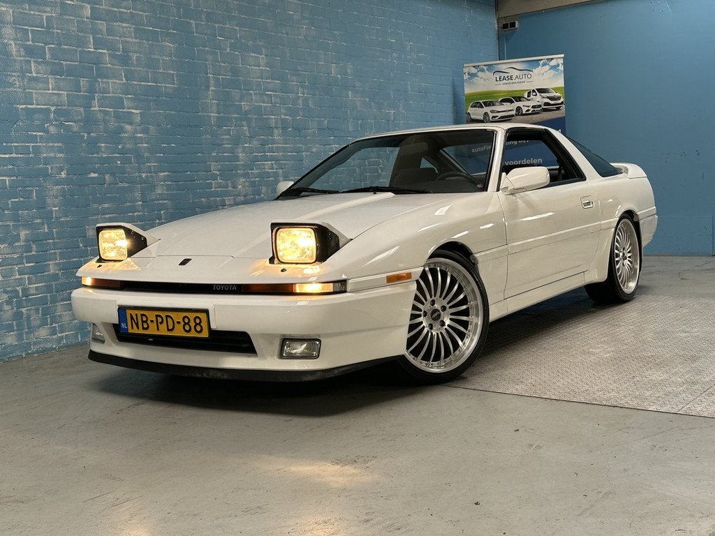 Toyota Supra 3.0i TC 24 AIRCO CRUISE NAVI LMV Auto is goede, Auto's, Oldtimers, Wit, Bluetooth, Bedrijf, Handgeschakeld
