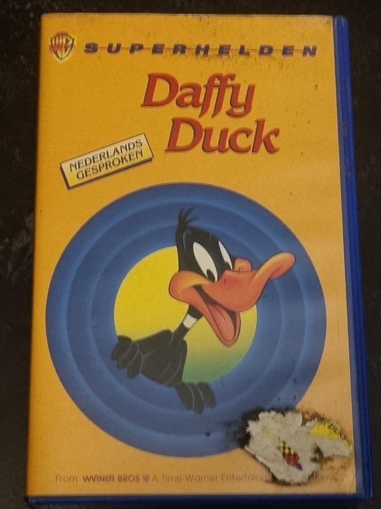 Daffy Duck VHS - Superhelden - Nederlands Gesproken, Cd's en Dvd's, VHS | Kinderen en Jeugd, Gebruikt, Tekenfilm, Alle leeftijden
