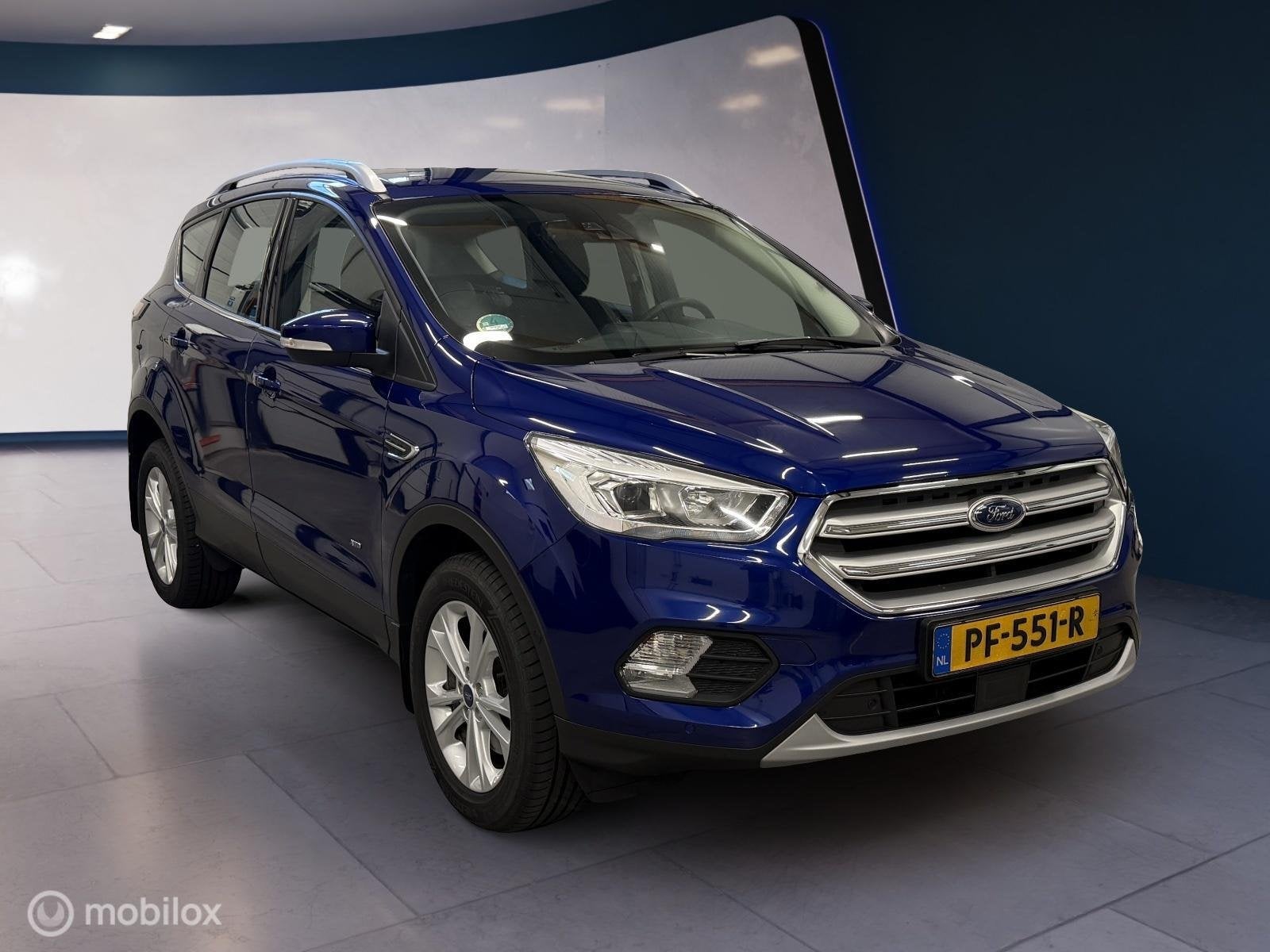 Ford Kuga 1.5 EcoBoost Titanium AUTACCTrekh.Wint, Auto's, Ford, Euro 6, 4 cilinders, 1850 kg, Blauw