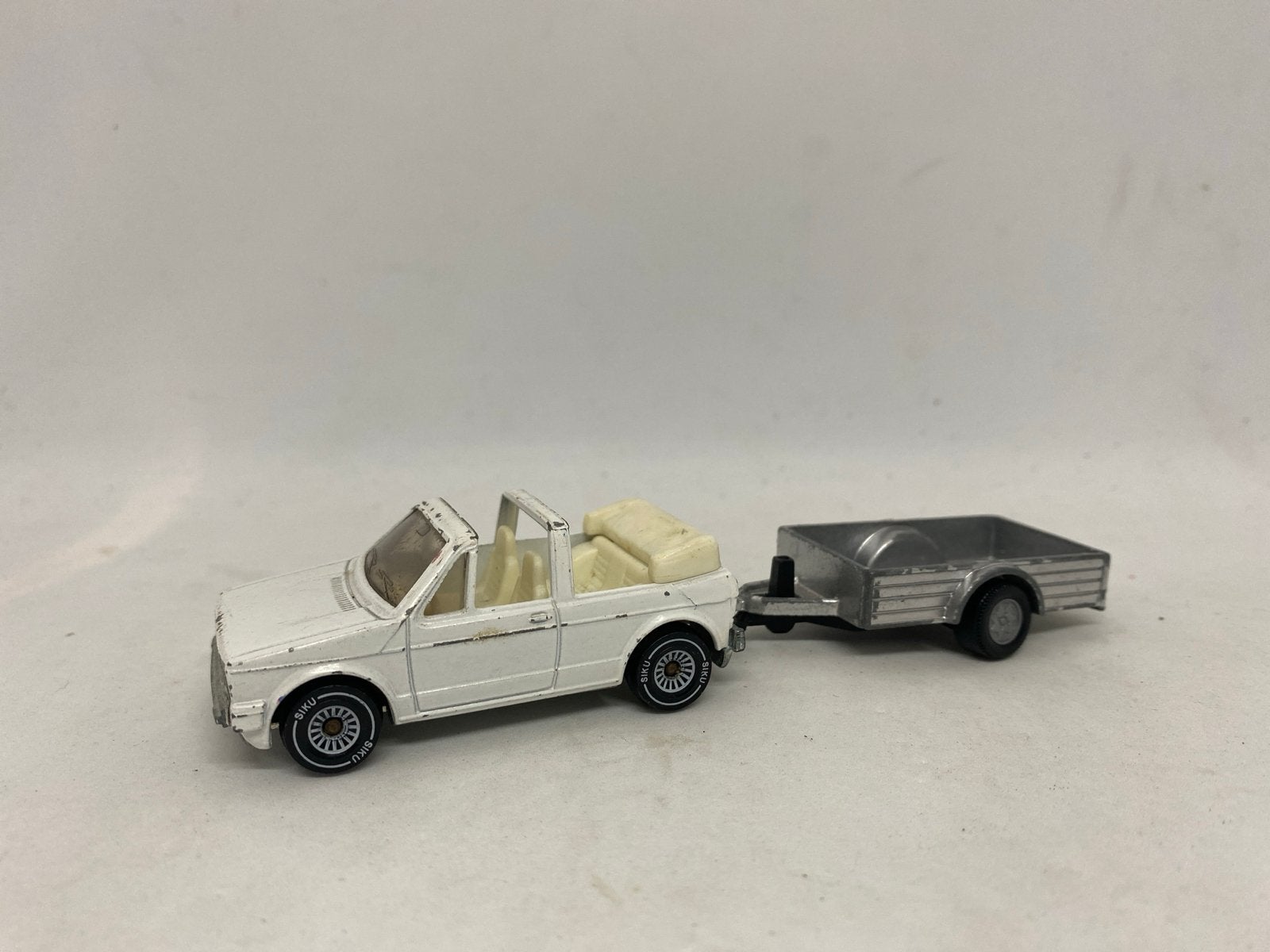 Vintage Siku VW Golf Cabriolet met aanhanger, Tel:. 0049 2351-876-0, Gebruikt, Sieper GmbH Schlittenbacher Straße 60 58511 Lüdenscheid Germany