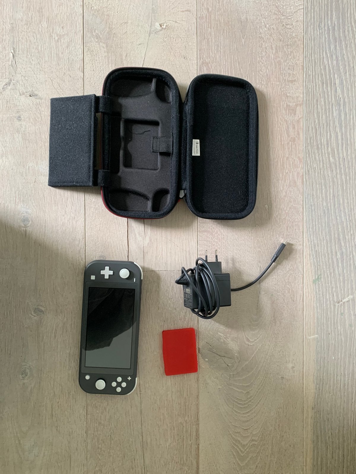 Nintendo switch lite, Ophalen, Grijs, Zo goed als nieuw, Met beschermhoes of tas
