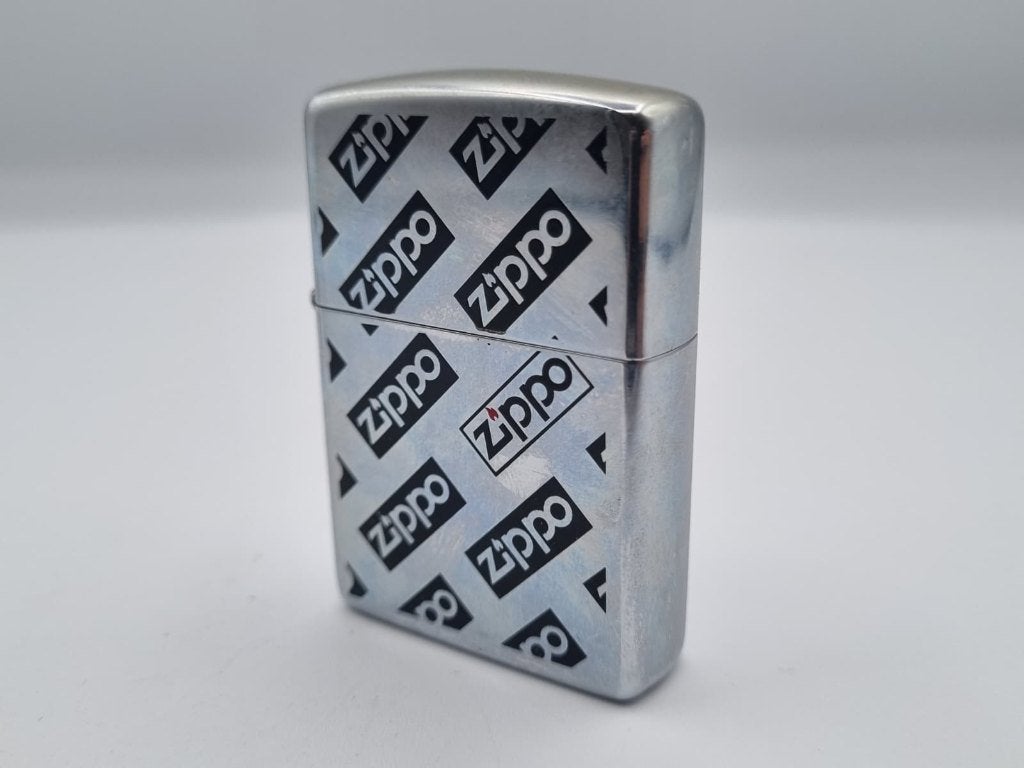 Zippo All Over Zippo Logo Aansteker 1994, Verzenden, Zo goed als nieuw, Aansteker