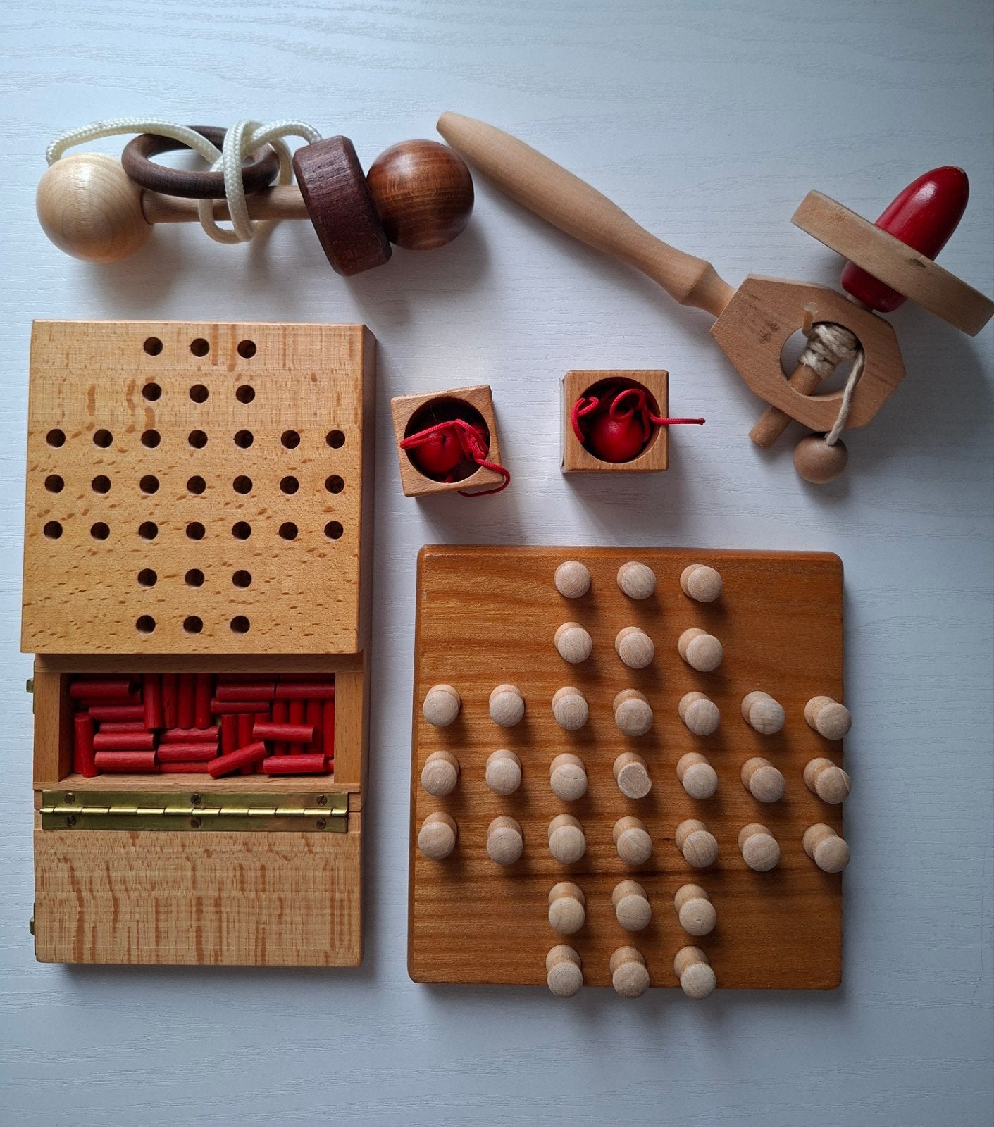 Houten speelgoed set: tol, puzzels en spel, Ophalen of Verzenden, Gebruikt, Overige typen
