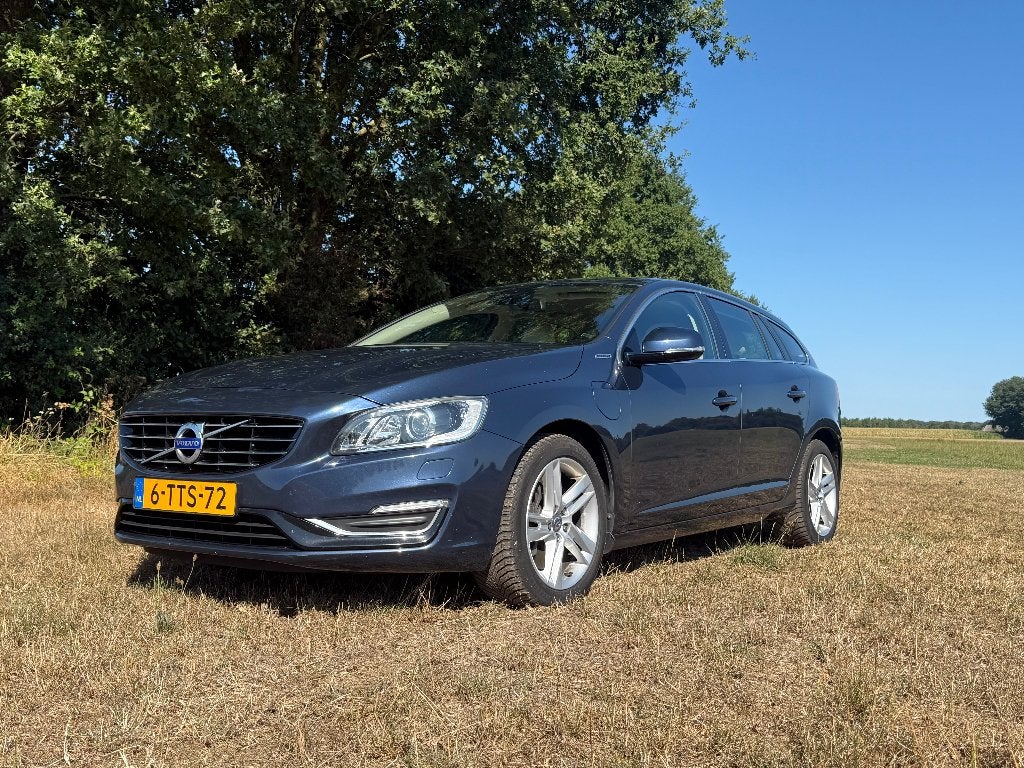 Volvo V60 D6 215pk Plug-in Hybrid 2014 Blauw, Auto's, Automaat, 1800 kg, Blauw, Vierwielaandrijving