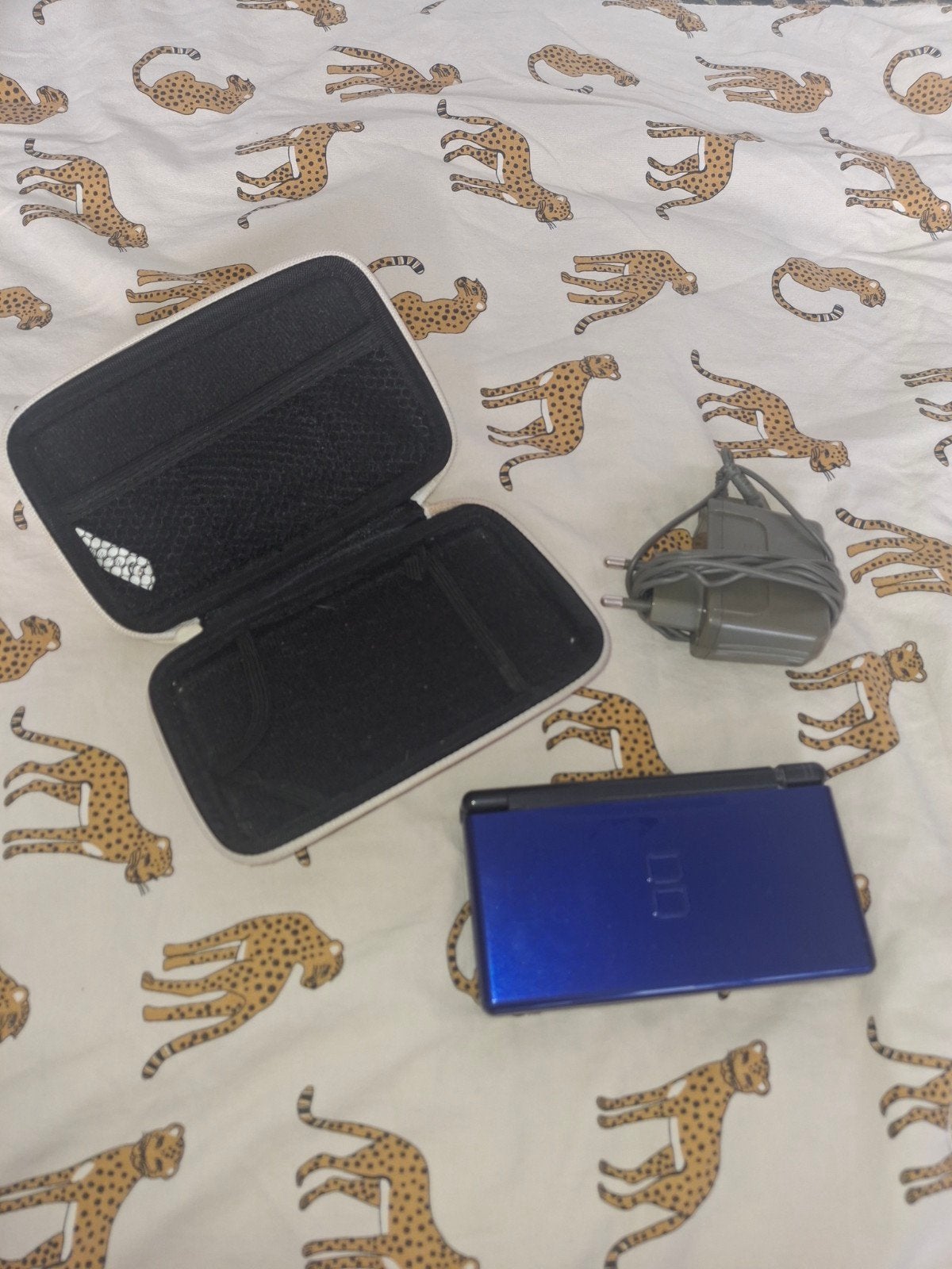 Nintendo DS Lite (oud model) met games en hoesje, Spelcomputers en Games, Ophalen of Verzenden