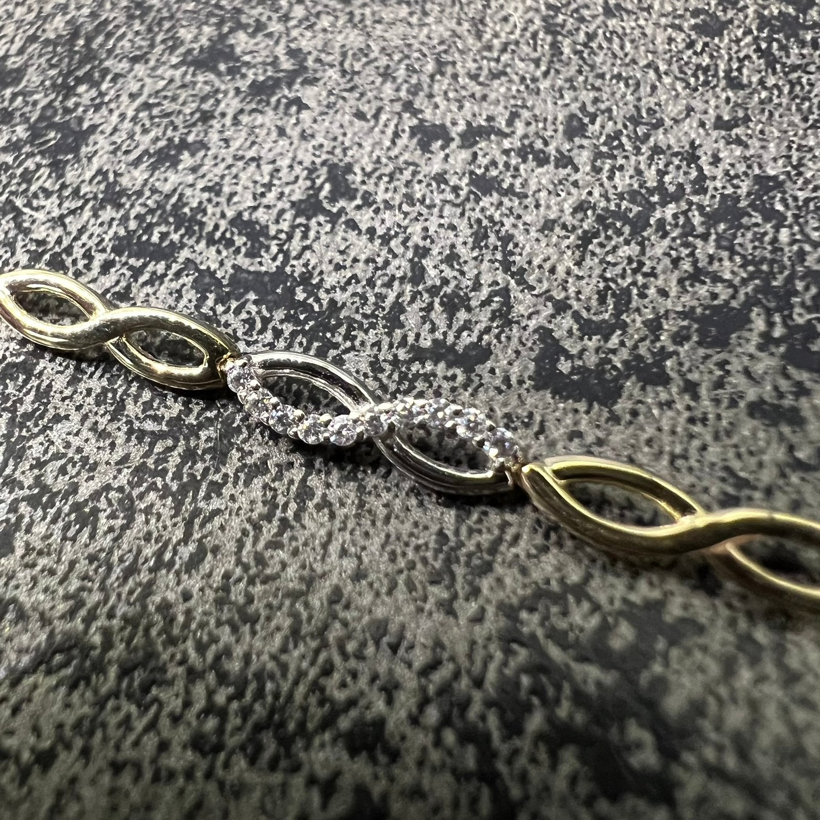14k gouden armband infinity schakel, Ophalen of Verzenden, Zo goed als nieuw, Goud