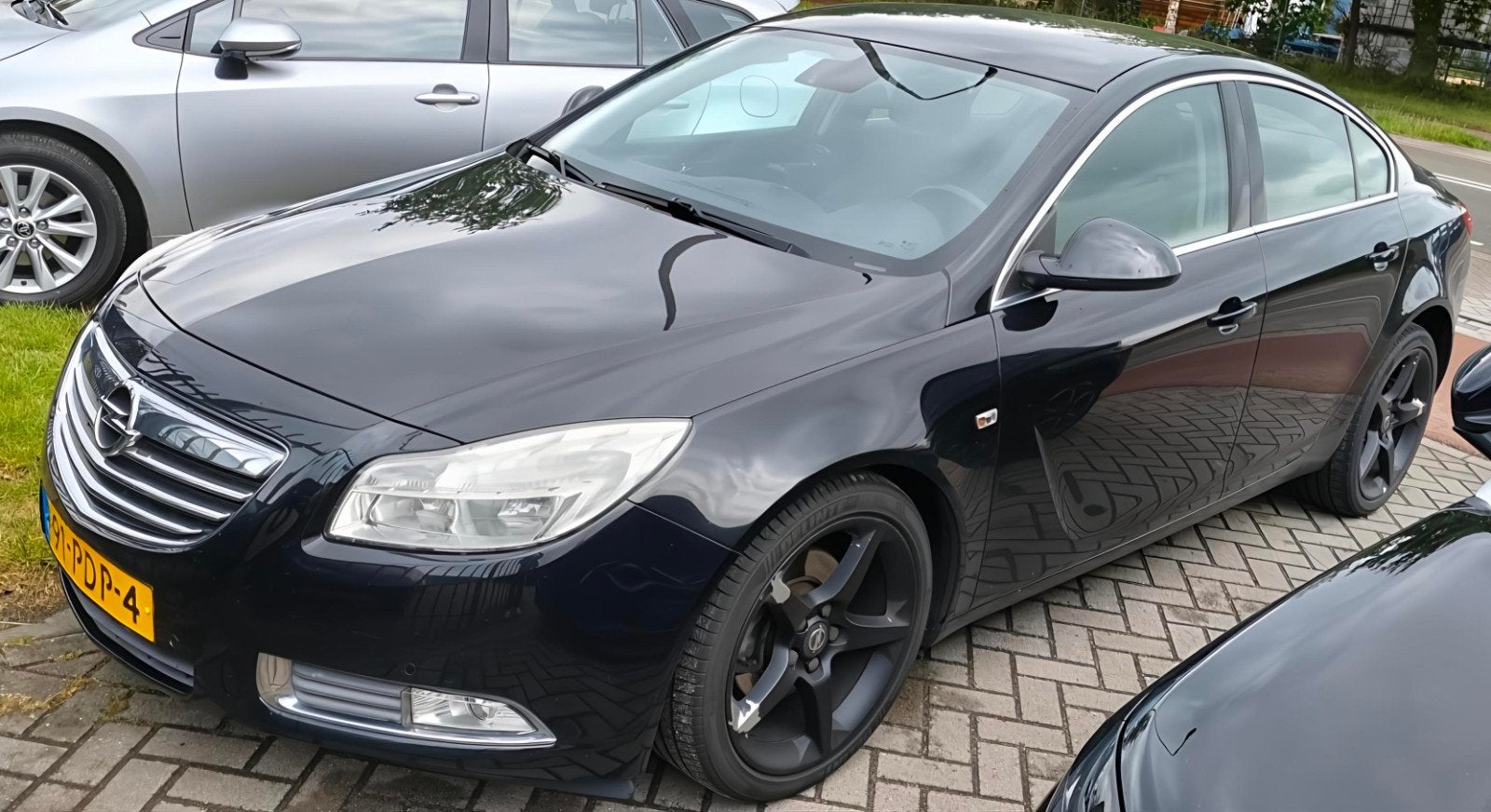Opel Insignia 1.6 Turbo 132KW 4-DRS 2011 Zwart, Auto's, Euro 5, Stof, 4 cilinders, 179 pk