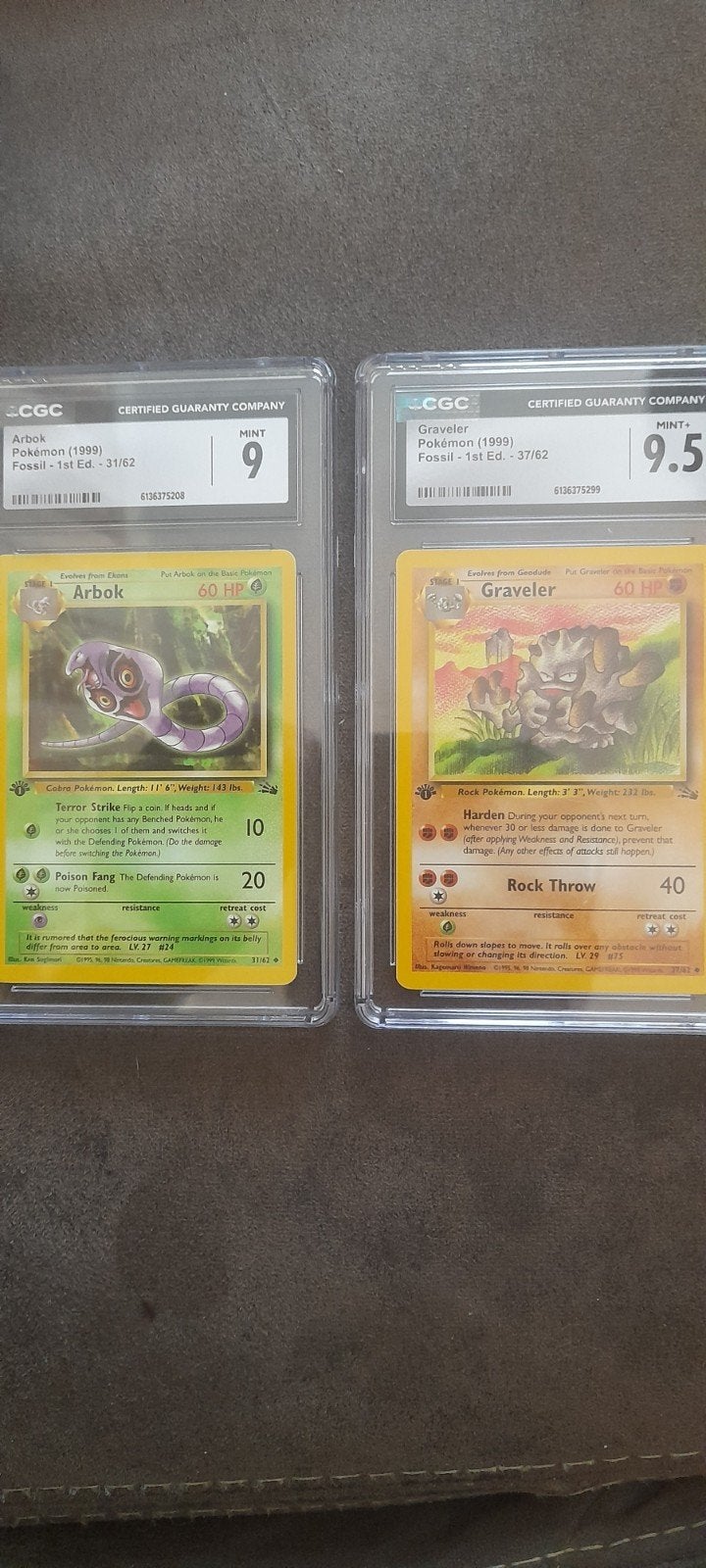 Pokémon CGC Graded Arbok & Graveler 1st Edition Fossil, Ophalen of Verzenden