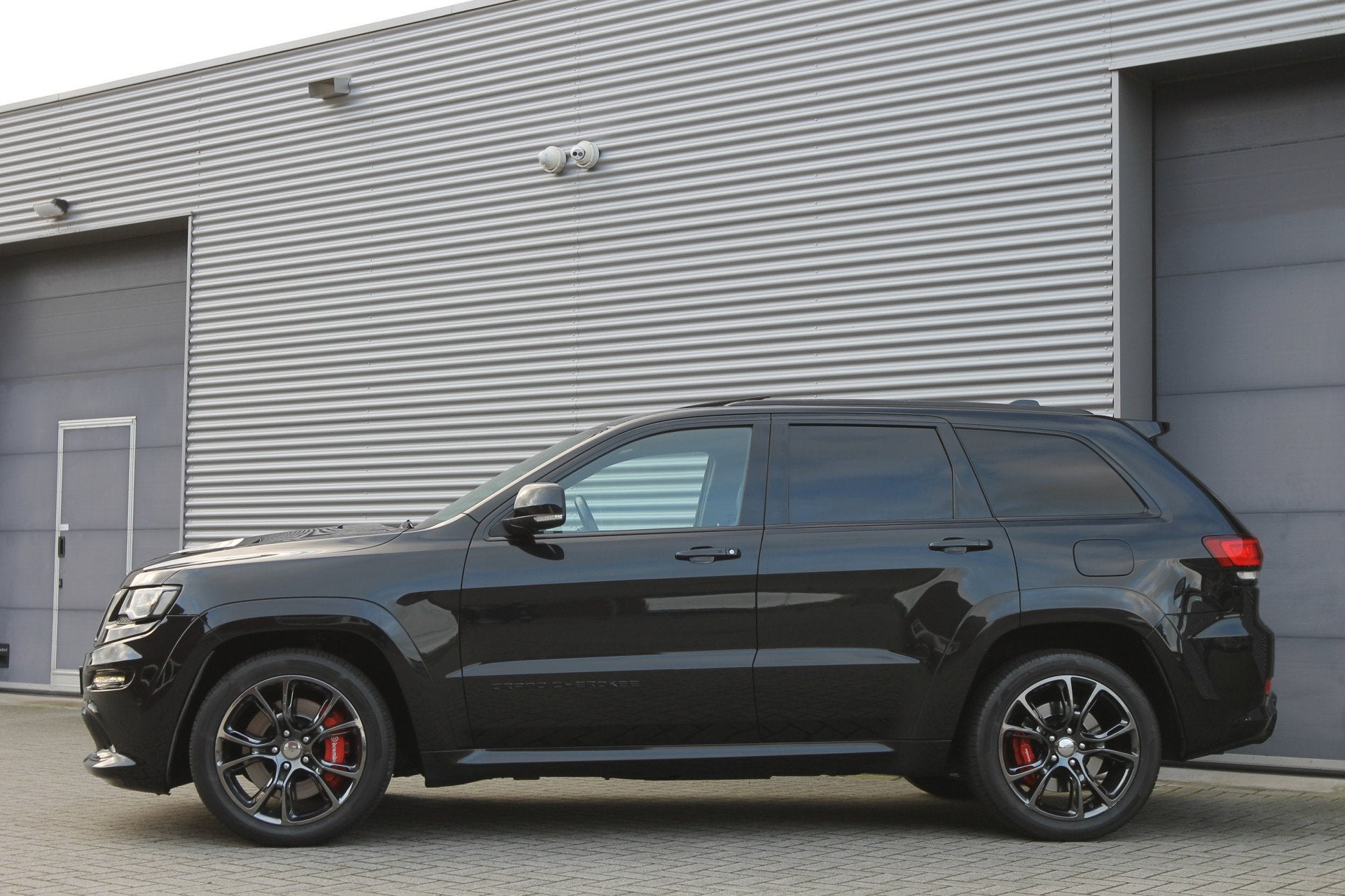Jeep Grand Cherokee 6.4 V8 SRT8 I Aut. I 468 PK I Grijs Kent, Auto's, Zwart, Bedrijf, 468 pk, Vierwielaandrijving