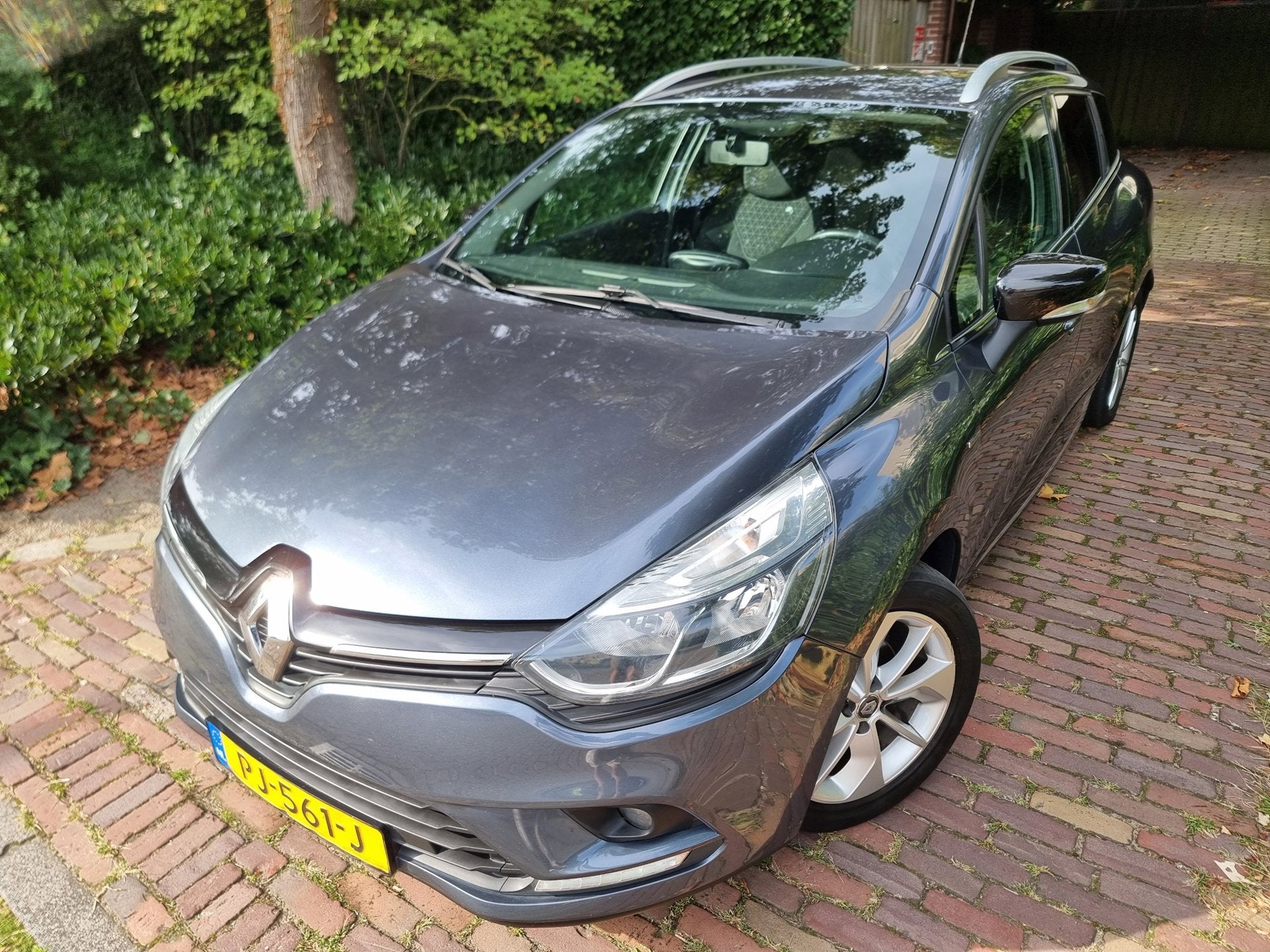 Renault Clio Estate 1.5 dCi Ecoleader Limited EURO6/Navi/Pdc, Auto's, Voorwielaandrijving, Euro 6, 4 cilinders, Origineel Nederlands