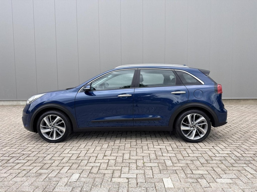 Kia Niro 1.6 GDi Hybrid First Edition Carplay|NL Auto|Trekha, Gebruikt, Euro 6, Met garantie (alle), Blauw