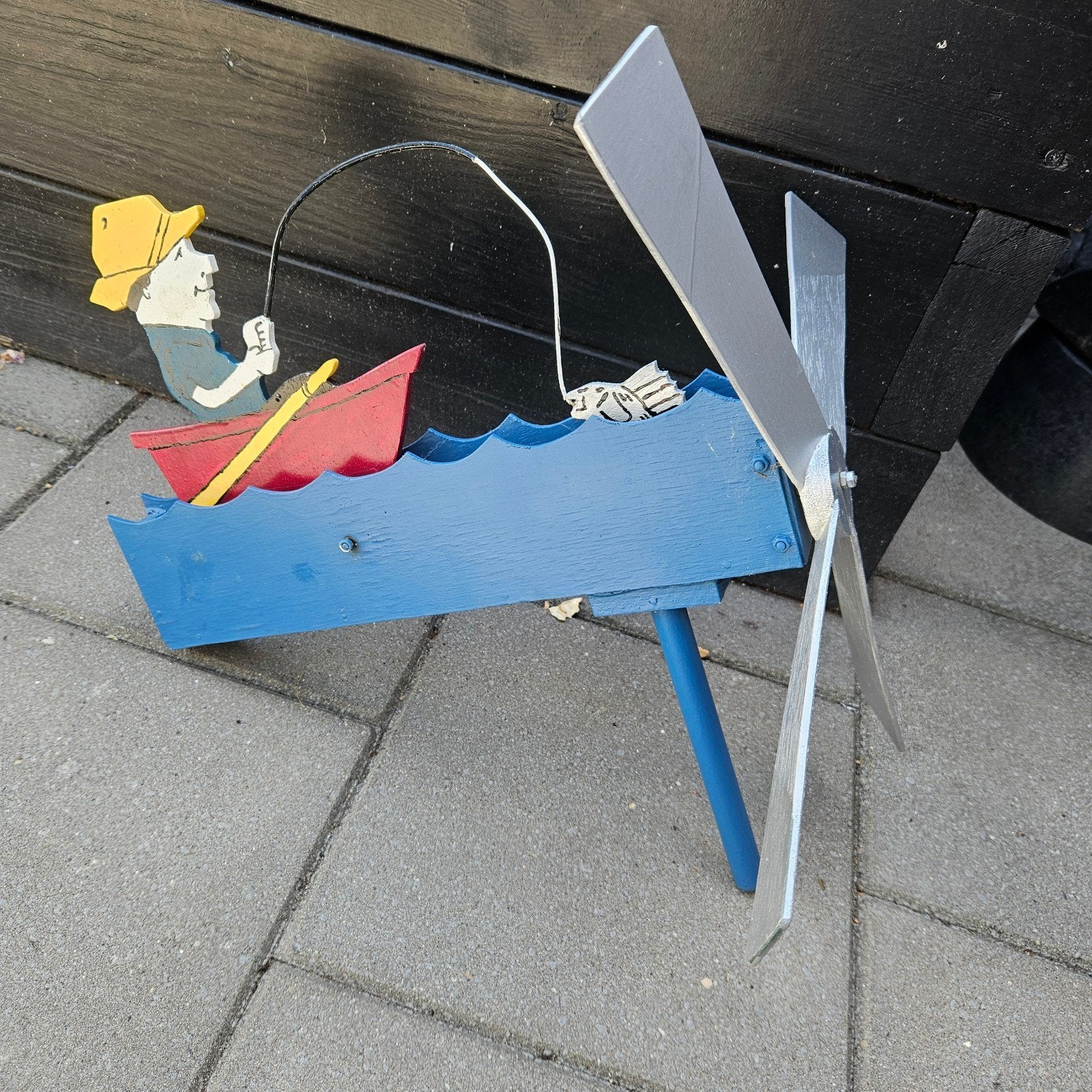 Windwaaier met visser in bootje, Ophalen, Gebruikt