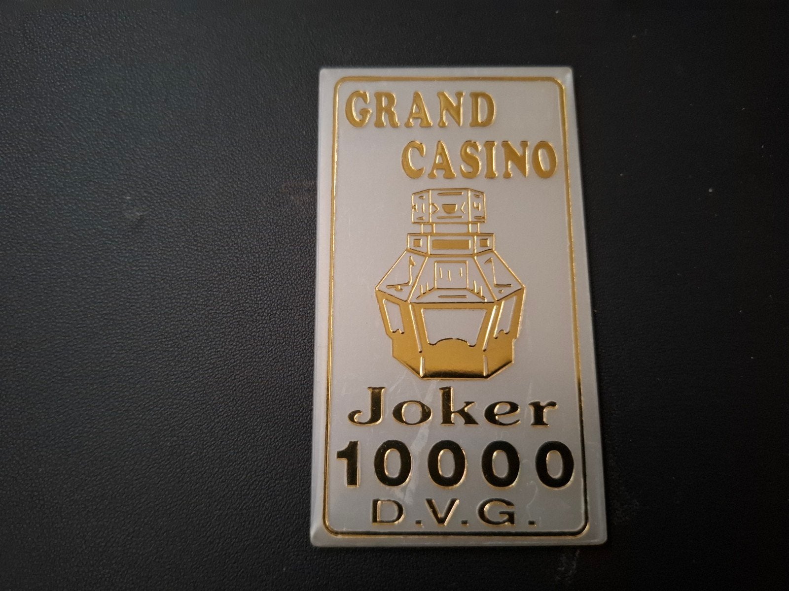 10.000 joker dvg coin pusher kermis penning, Ophalen of Verzenden, Overige materialen
