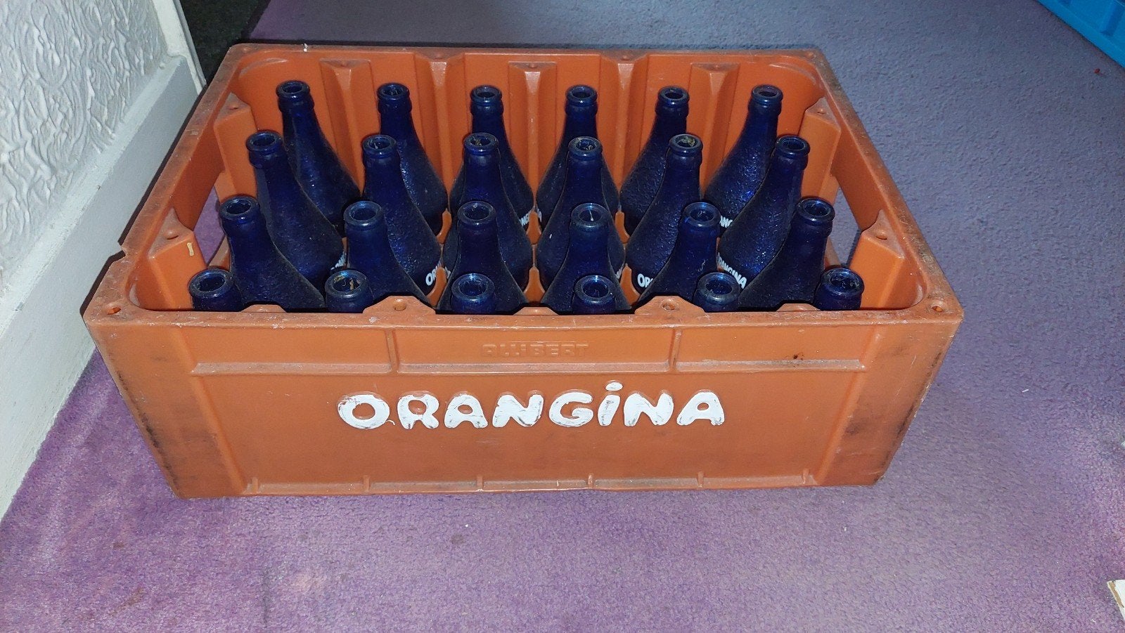 Orangina krat met blauwe flesjes  24 stuks, Ophalen of Verzenden, Gebruikt, Overige typen