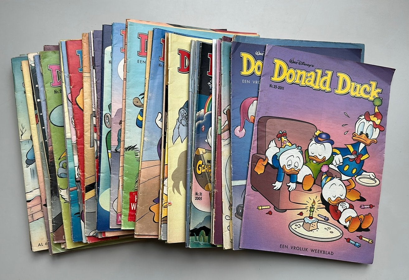 Donald Duck 53 nummers verschillende jaargangen, Gelezen, Europa, Ophalen of Verzenden, Meerdere comics