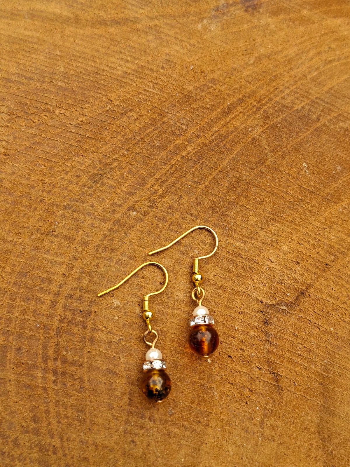 oorbellen amber barnsteen met pareltje en strass, Overige materialen, Hangers, Bruin, Met edelsteen