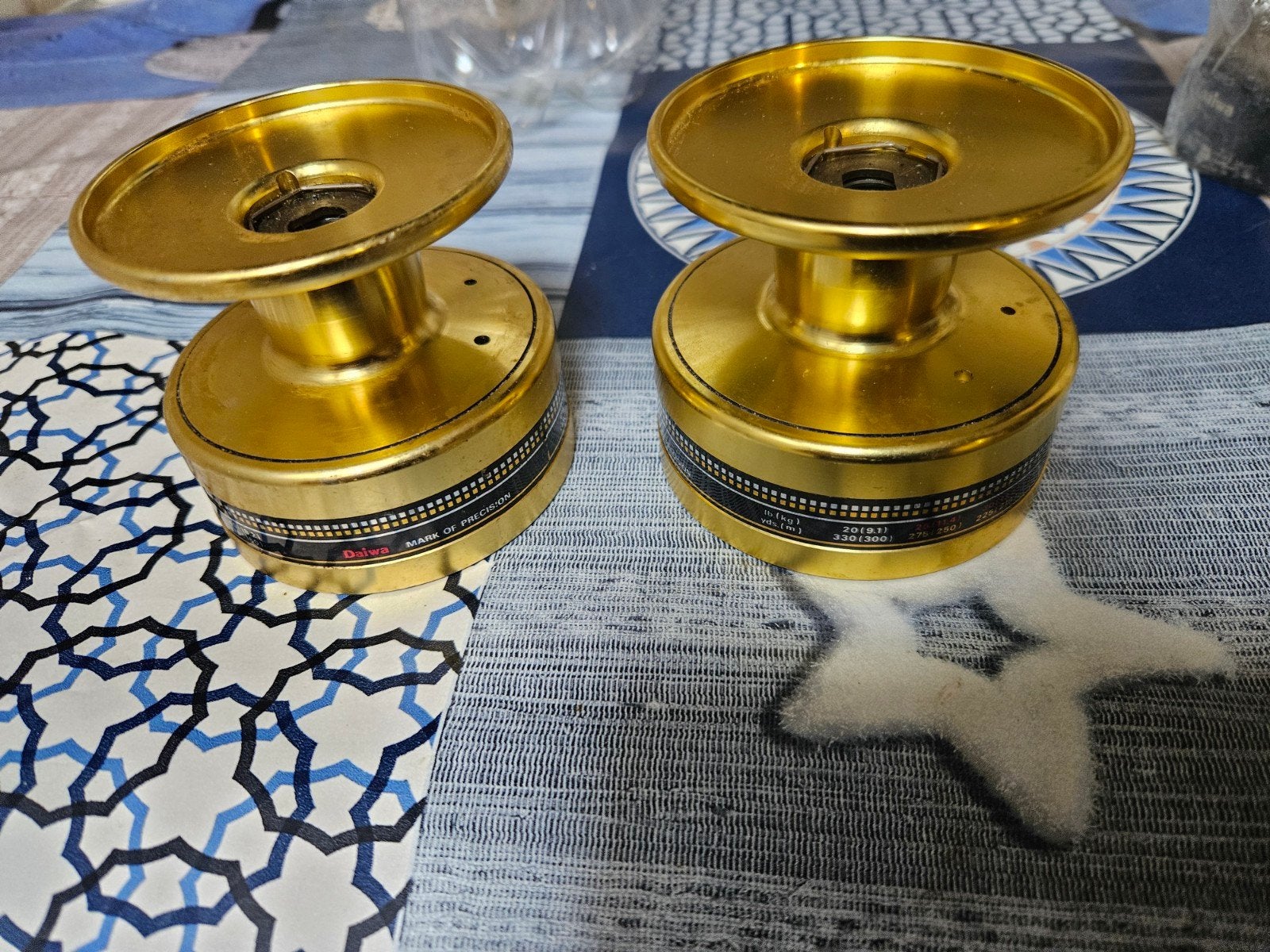 Daiwa gold molenspoelen (2 stuks), Ophalen of Verzenden, Gebruikt, Molen