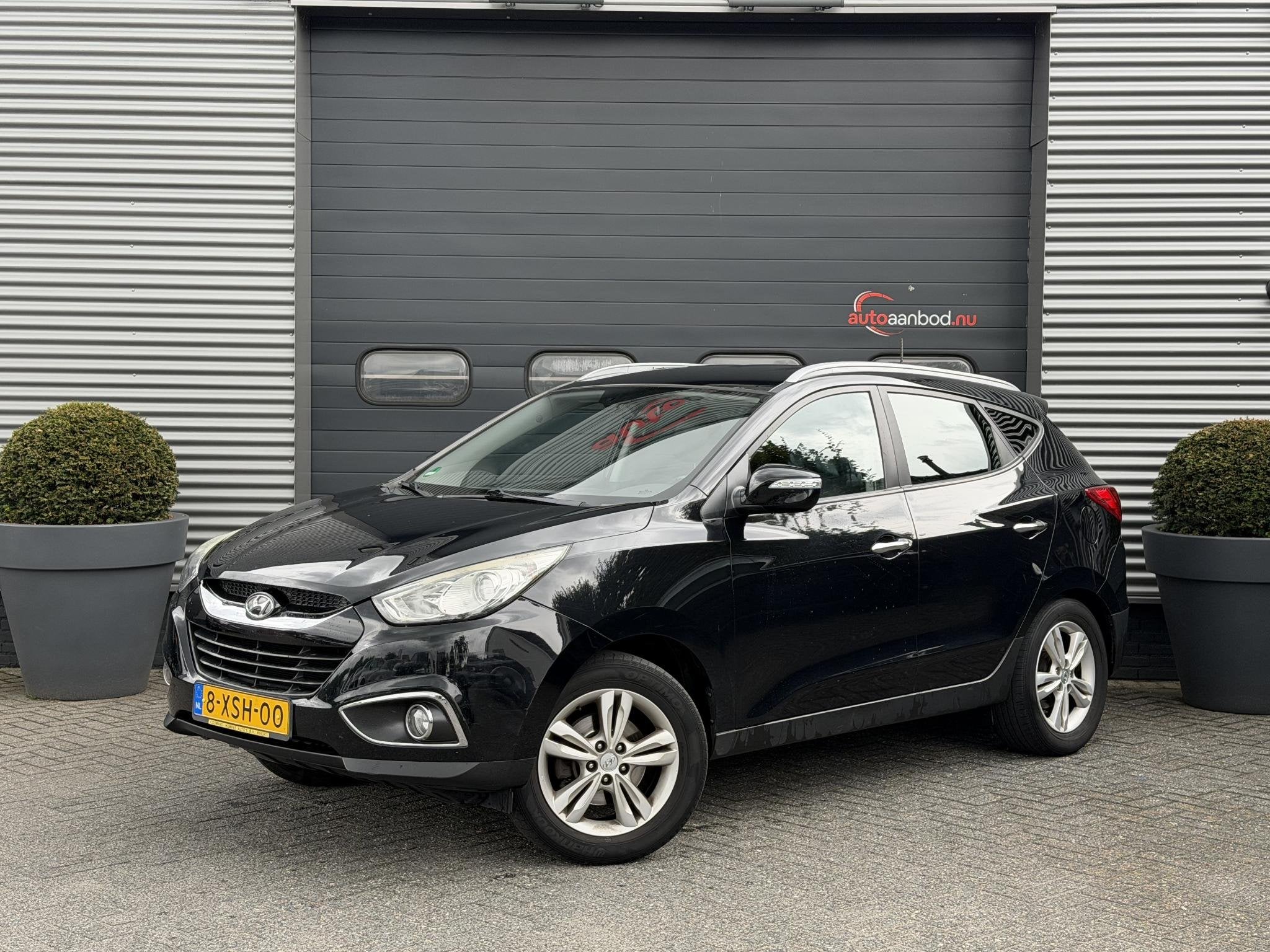 Hyundai ix35 2.0i 4WD i-Catcher | Camera | Navigatie | Clima, Auto's, Automaat, 1502 kg, Gebruikt, Leder