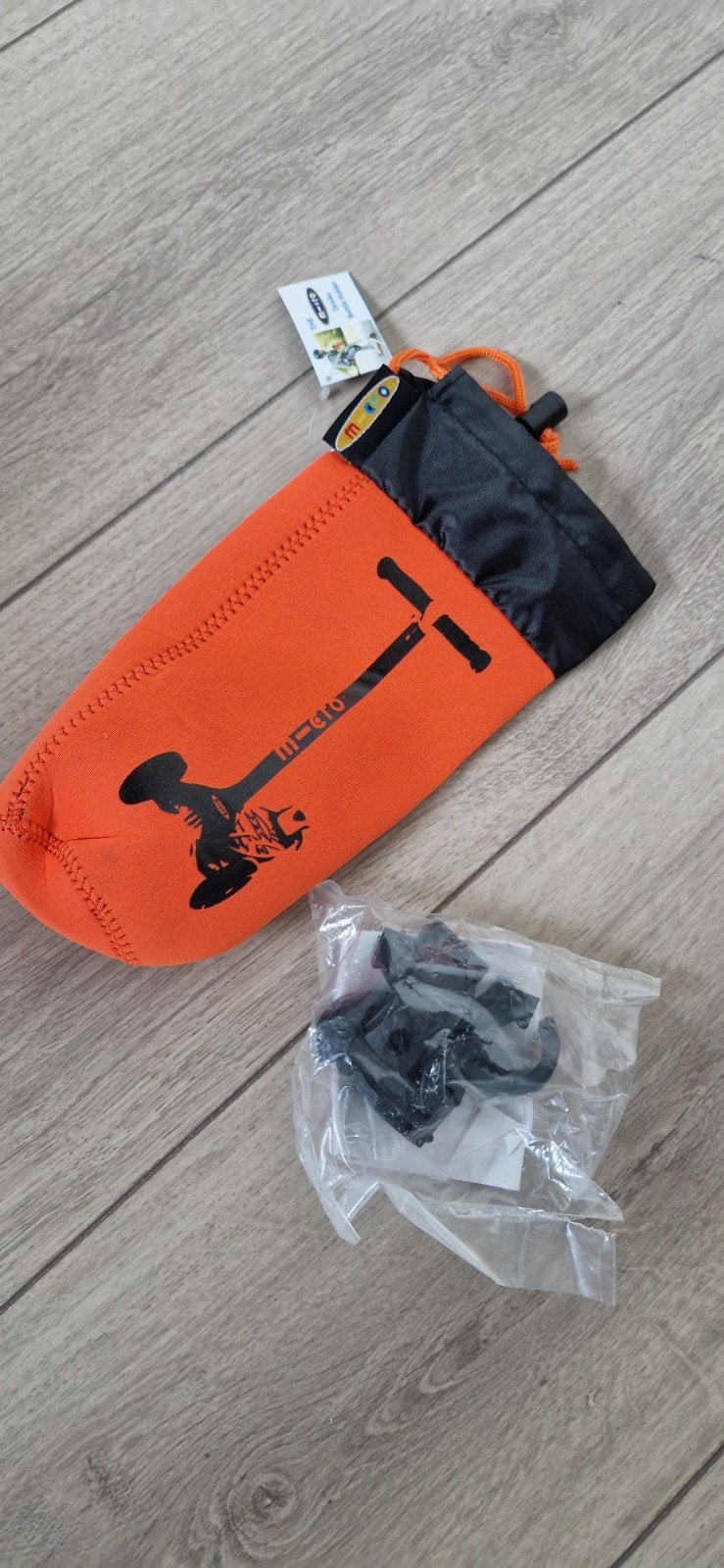 Micro step accessoires: Oranje hoes voor fles, Fietsen en Brommers, Steps, Ophalen of Verzenden, Zo goed als nieuw, Overige typen