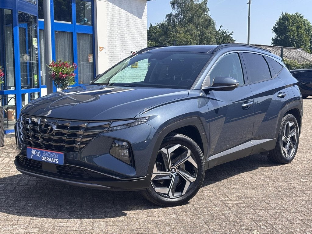 Hyundai Tucson 1.6 T-GDI PHEV Premium 4WD l Panoramadak, Sto, Auto's, Hyundai, Automaat, Lichtsensor, 14 kWh, Gebruikt