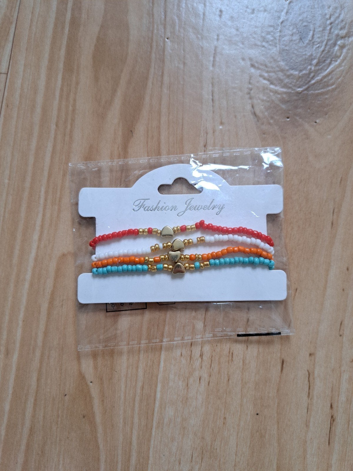 Set van 4 kralenarmbandjes met hartjes, Overige kleuren, Nieuw, Ophalen of Verzenden, Elastiek