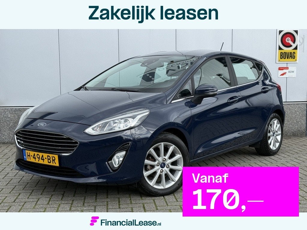Ford Fiesta 1.0 EcoB. Titanium | NAP | CarPlay | Park.sensor, Stof, Gebruikt, 580 kg, Blauw