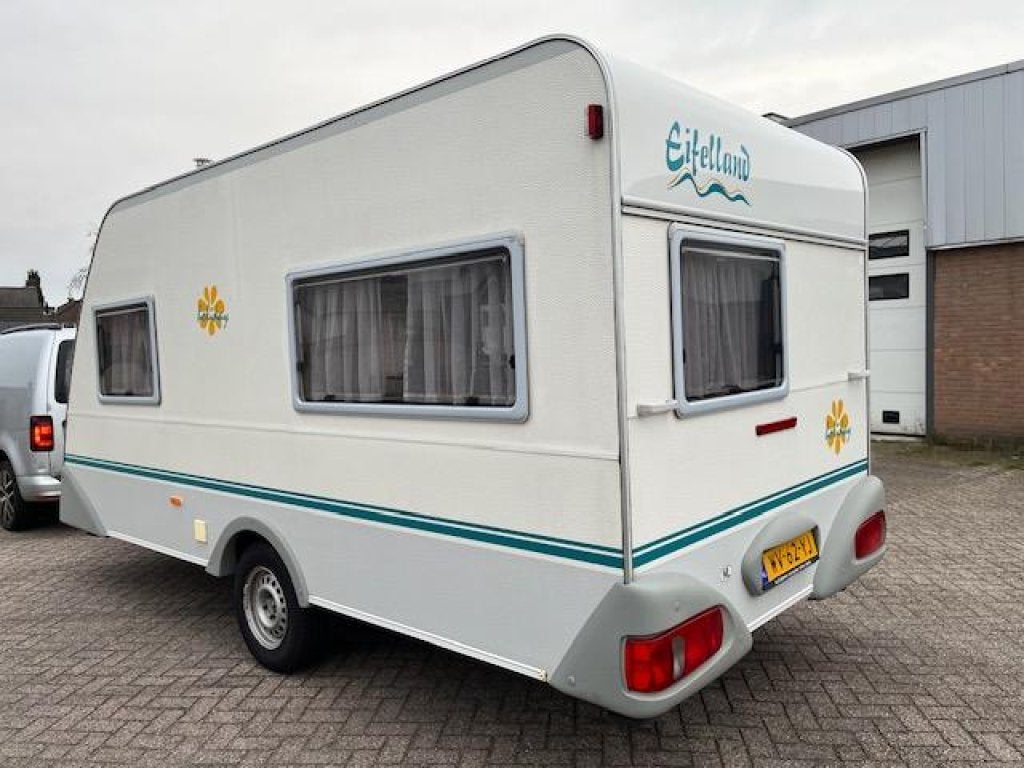 Eifelland Holiday 415 TM Incl. Voortent en Luifel, Overige typen, Bedrijf, Treinzit, 750 - 1000 kg