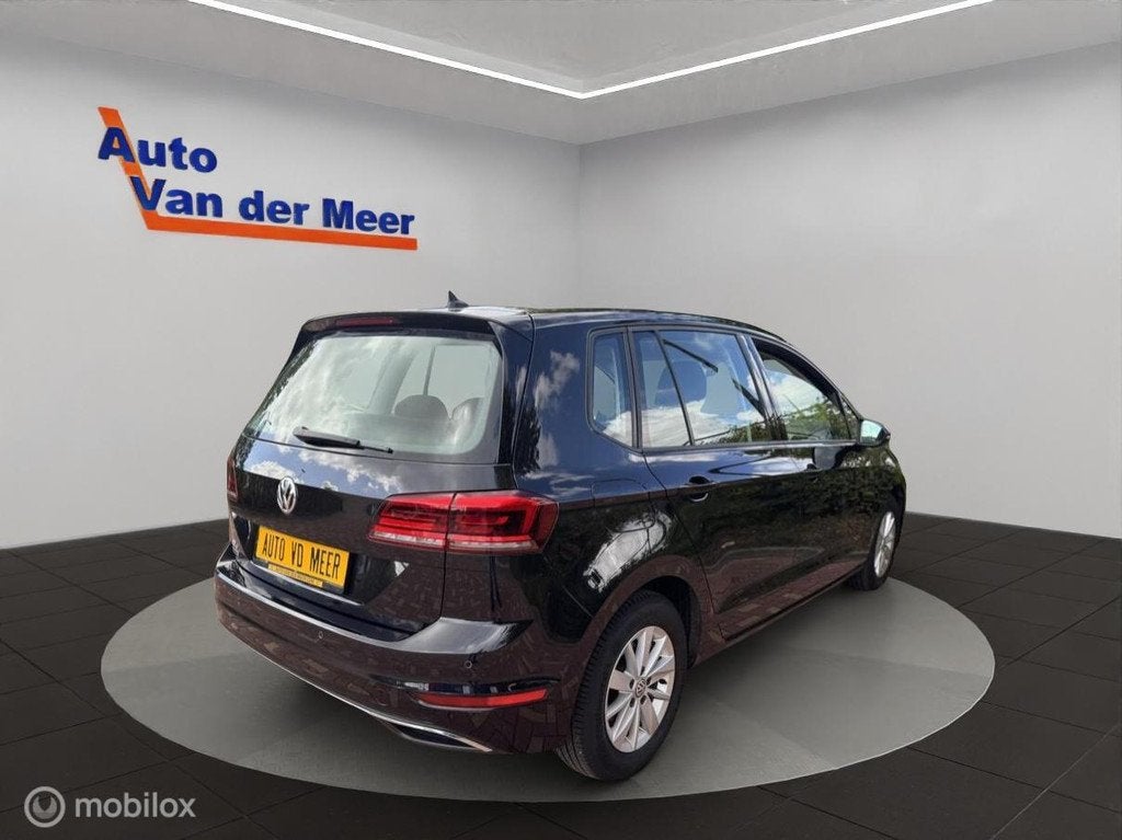 Volkswagen Golf Sportsvan 1.5 TSI ACT Comfortline, Auto's, Volkswagen, 4 cilinders, Zwart, Golf Sportsvan, Bedrijf