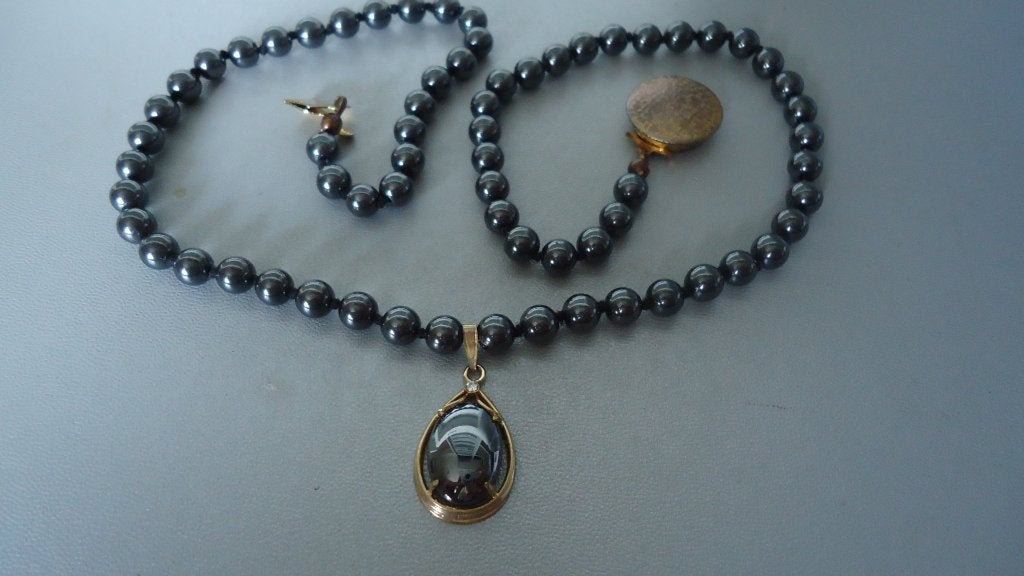 Goud vergulde Onix ketting met hanger, Sieraden, Tassen en Uiterlijk, Kettingen, Zwart, Ophalen of Verzenden, Zo goed als nieuw