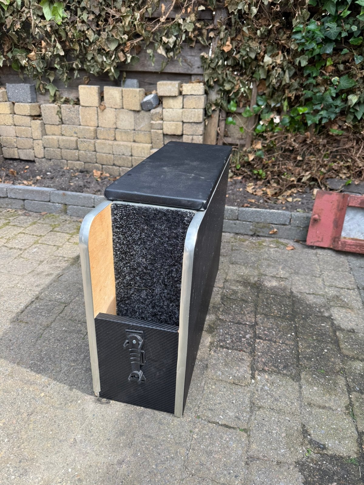 Universele middenarmsteun met opbergvak, Ophalen