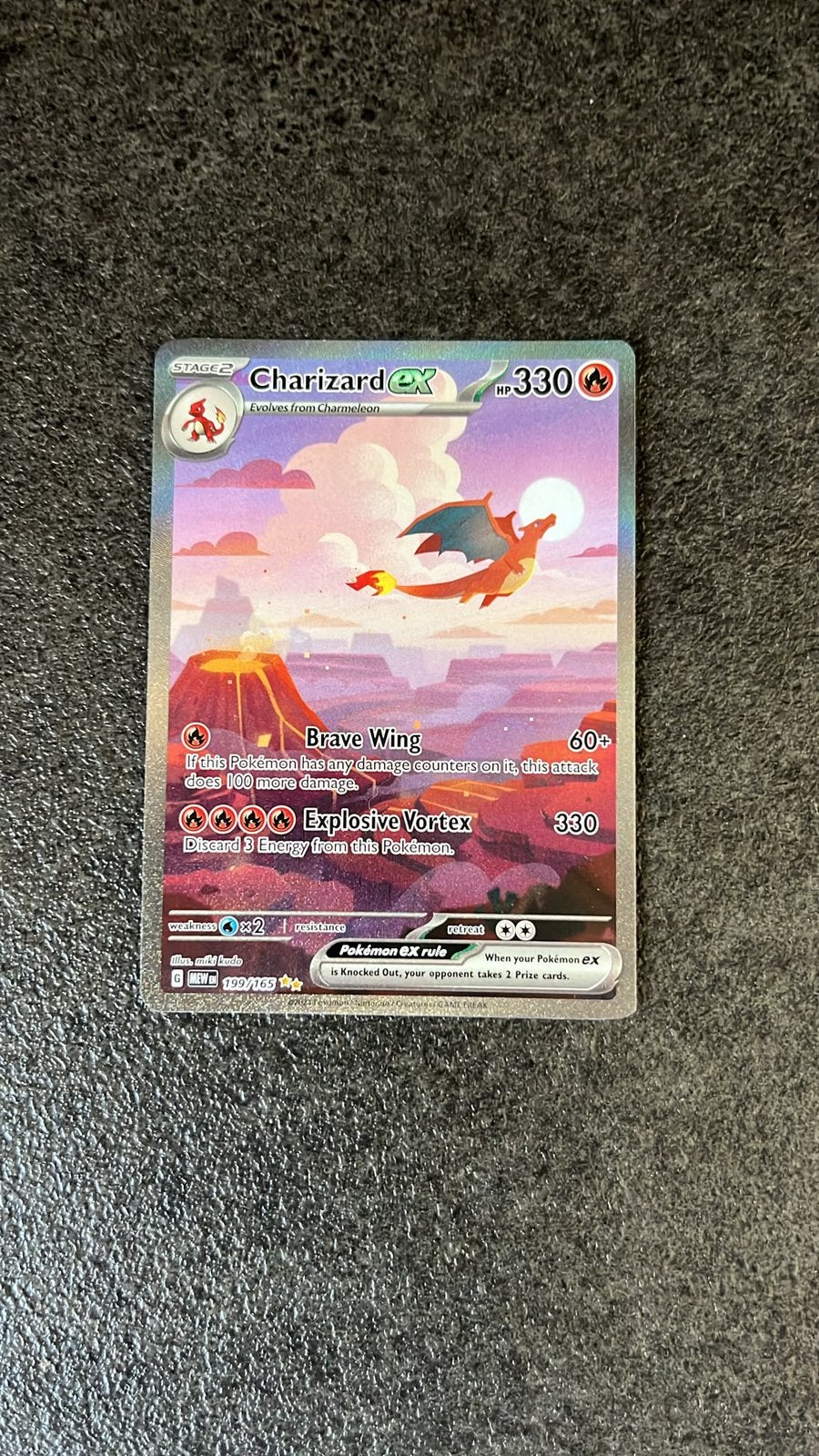 Charizard 199/165 (MEW151), Ophalen of Verzenden, Zo goed als nieuw