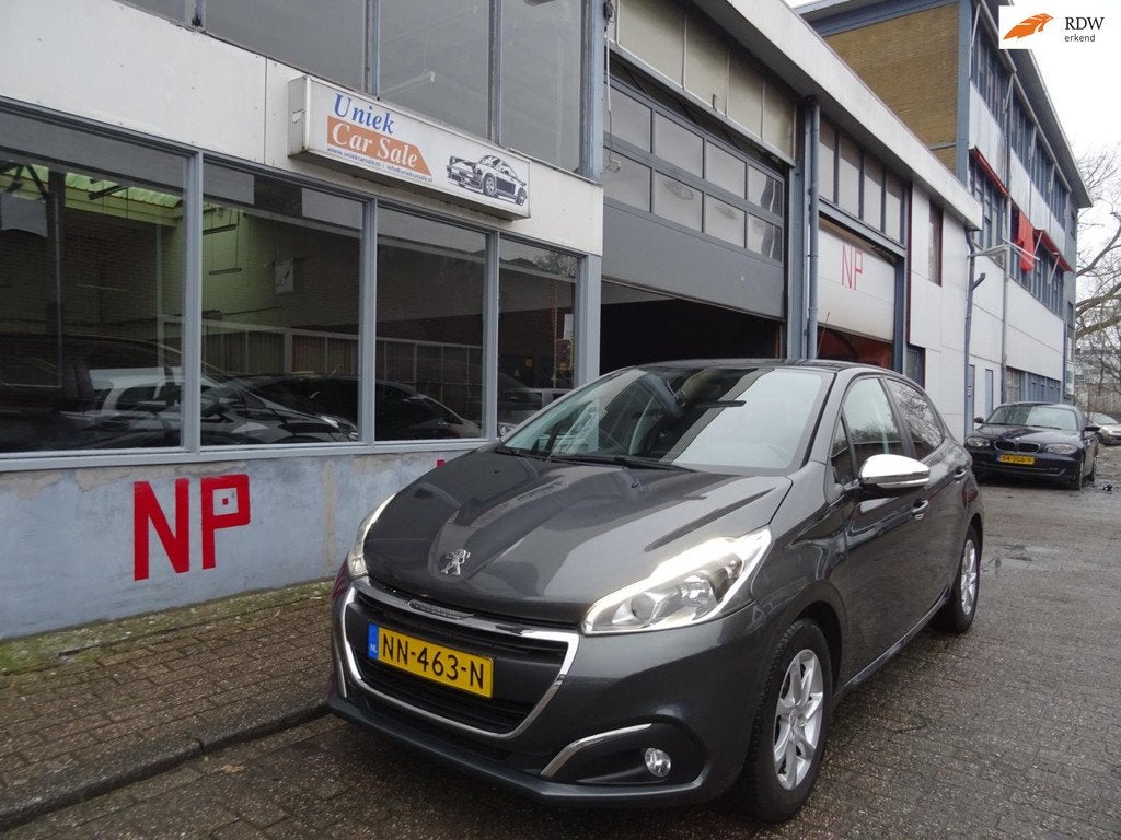 Peugeot 208 1.2 PureTech Blue Lease Premium, Auto's, Voorwielaandrijving, Gebruikt, 1199 cc, 82 pk