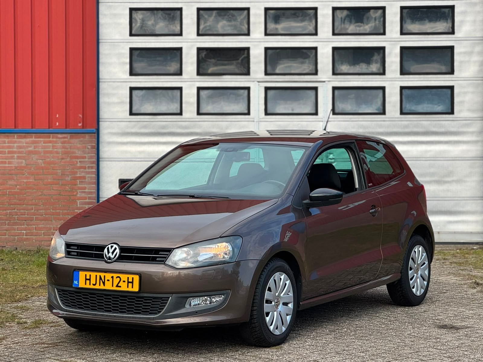 Volkswagen Polo 1.2 style | airco | cruise | stoelverwarming, Voorwielaandrijving, Euro 5, Bruin, 60 pk