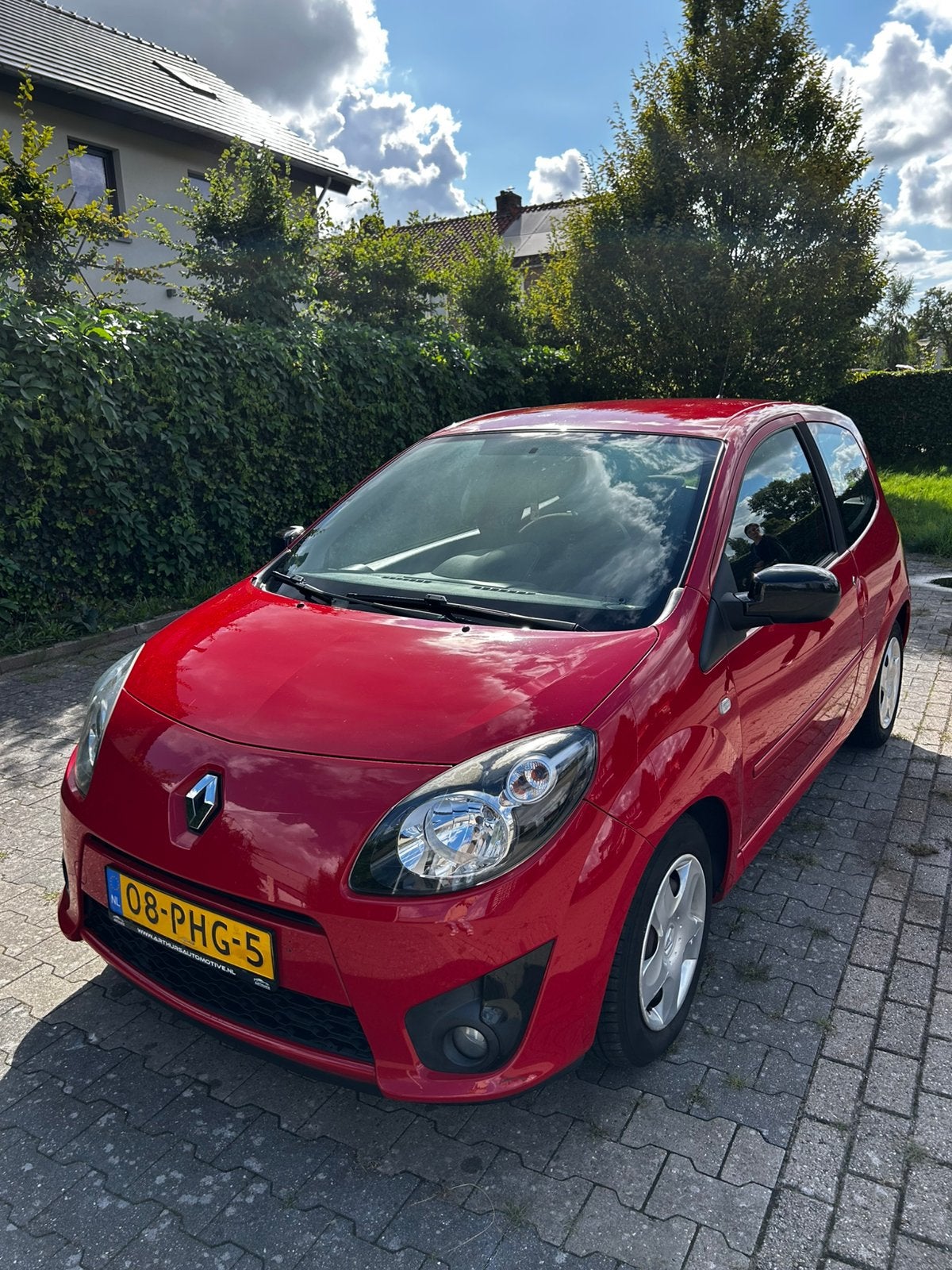Renault Twingo 1.2 16V 2011 Rood, Auto's, Renault, Twingo, 74 pk, 4 cilinders, 4 stoelen