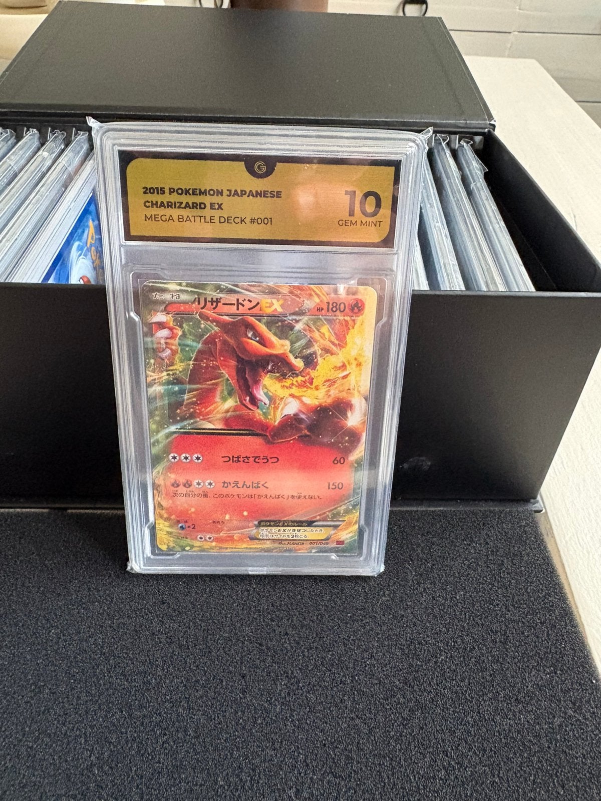 Charizard ex battle deck grade 10, Ophalen of Verzenden, Zo goed als nieuw, Meerdere kaarten, Foil