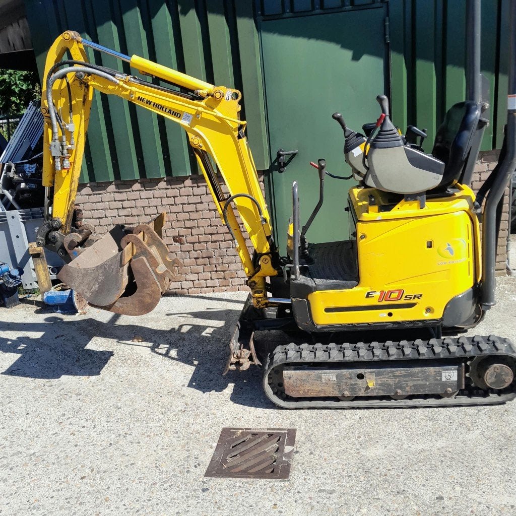 Graafmachine zeer nette New Holland E10SR, Ophalen, Gebruikt, Tot 2500, Tot 80 Pk