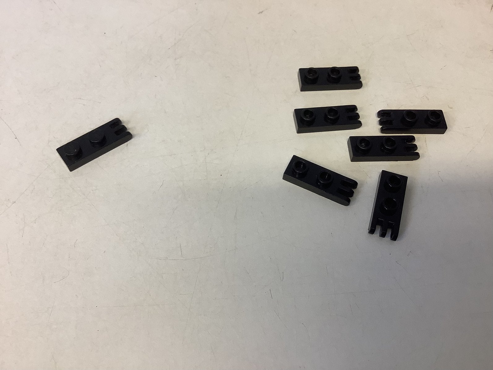 Lego scharnierplaat 1x2 met 3 vingers aan uiteinde zwart, Ophalen of Verzenden, Gebruikt, Losse stenen, Lego