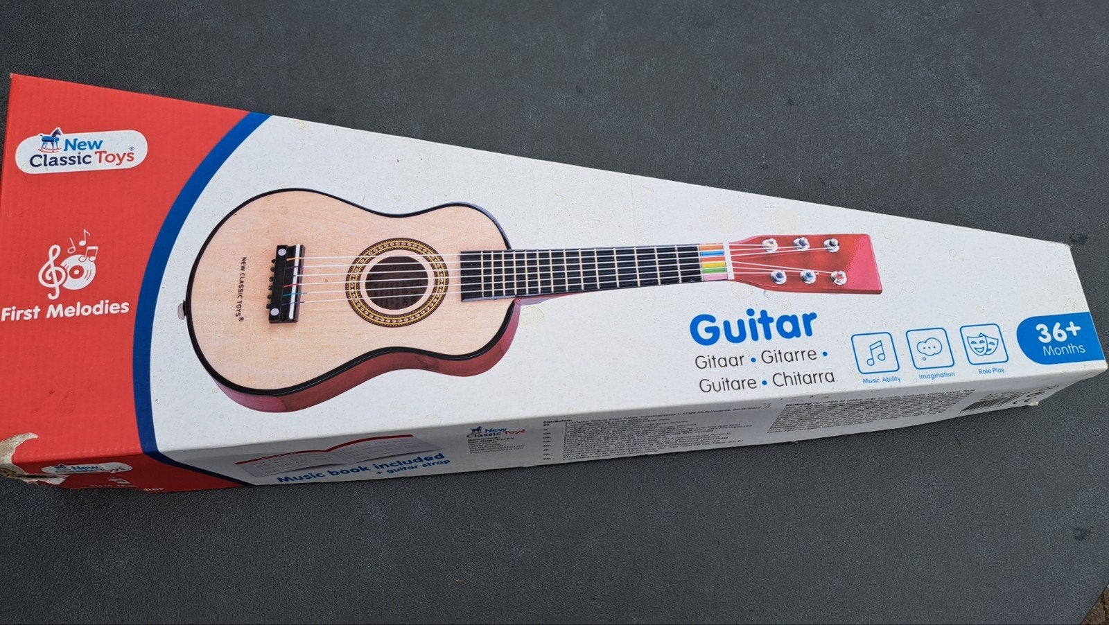 Speelgoed gitaar met muziekboekje, Ophalen of Verzenden, Gebruikt, Overige typen, Met geluid