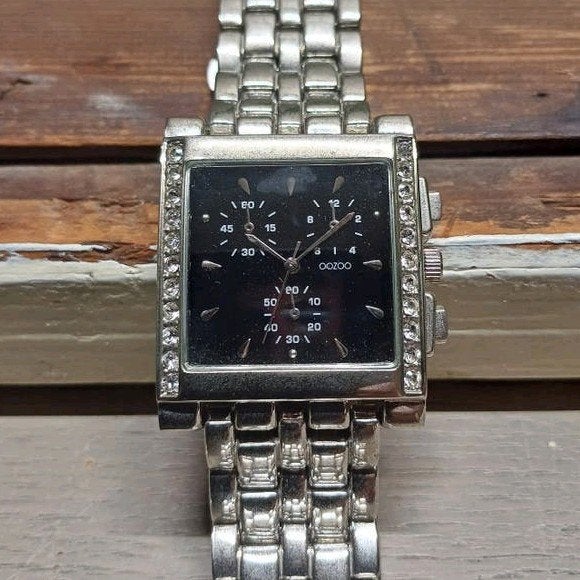 OOZOO HORLOGE ZWART VIERKANT MET L/R STRASS-STEENTJES, Sieraden, Tassen en Uiterlijk, Overige merken, Staal, Staal, Polshorloge