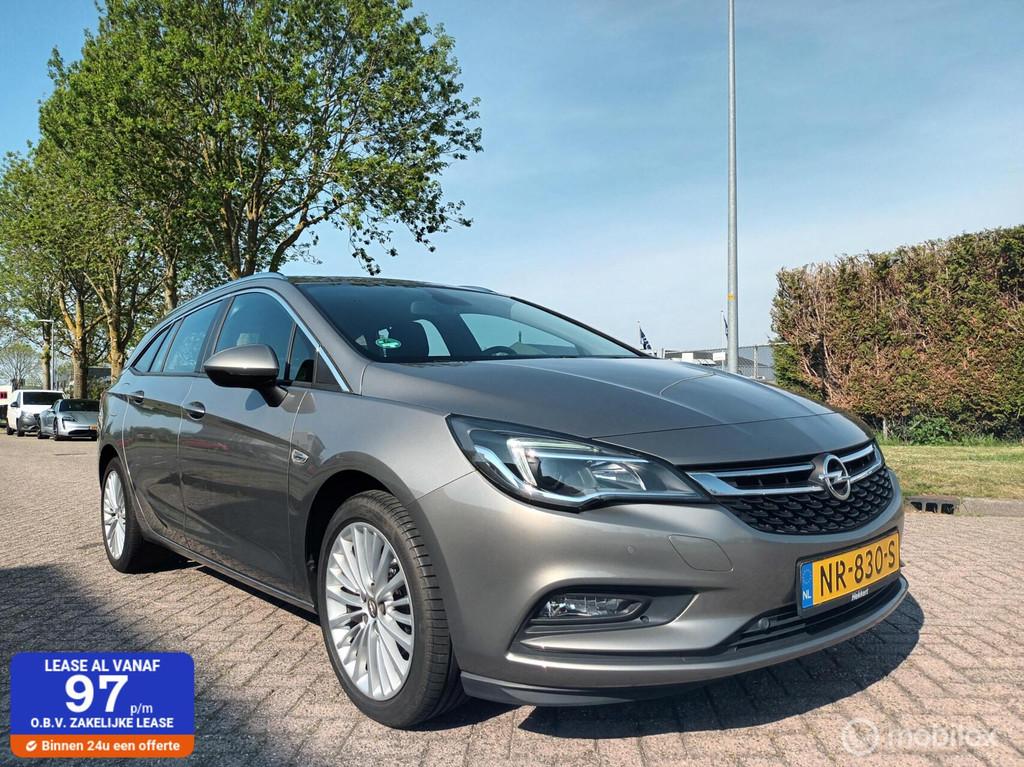 Opel Astra Sports Tourer 1.0 Online Edition Dealer onderhoud, Auto's, Voorwielaandrijving, Gebruikt, Euro 6, 1178 kg
