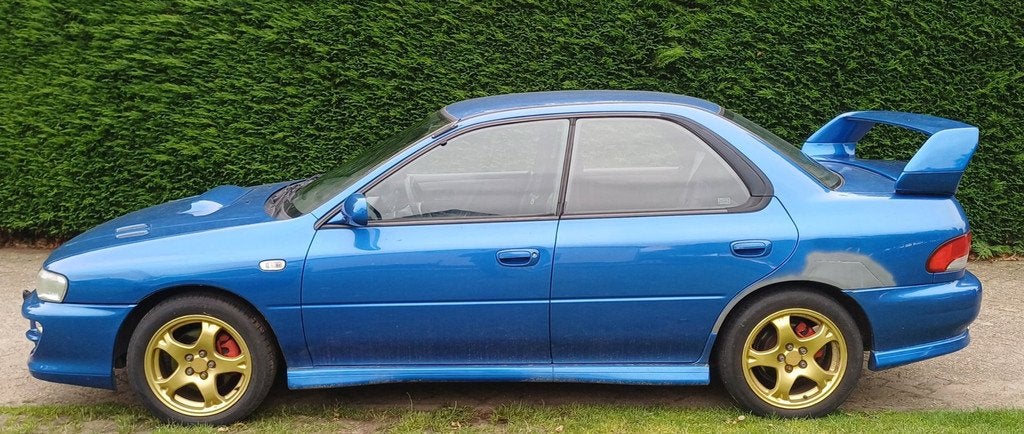 Subaru Impreza 2.0 GT AWD Turbo 555 Limited, Auto's, Gebruikt, 4 cilinders, Alcantara, Origineel Nederlands