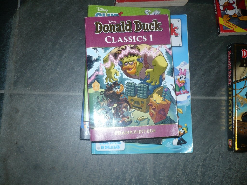 6 donald duck speciale uitgave pockets en 1 vakantie boek, Gelezen, Ophalen of Verzenden, Donald Duck, Meerdere stripboeken