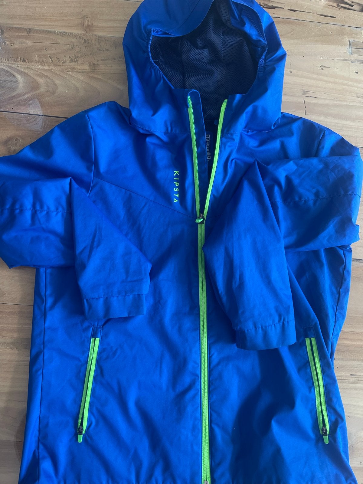 Kipsta regenjas blauw maat 141-153 cm (10-11 jaar), Ophalen of Verzenden, Zo goed als nieuw, Jongen of Meisje