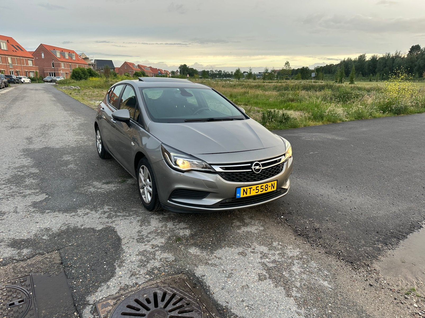 Opel Astra 1.0 Turbo 77KW PANO CARPLAY 5D 2017 Grijs, 610 kg, 23 km/l, Origineel Nederlands, Handgeschakeld