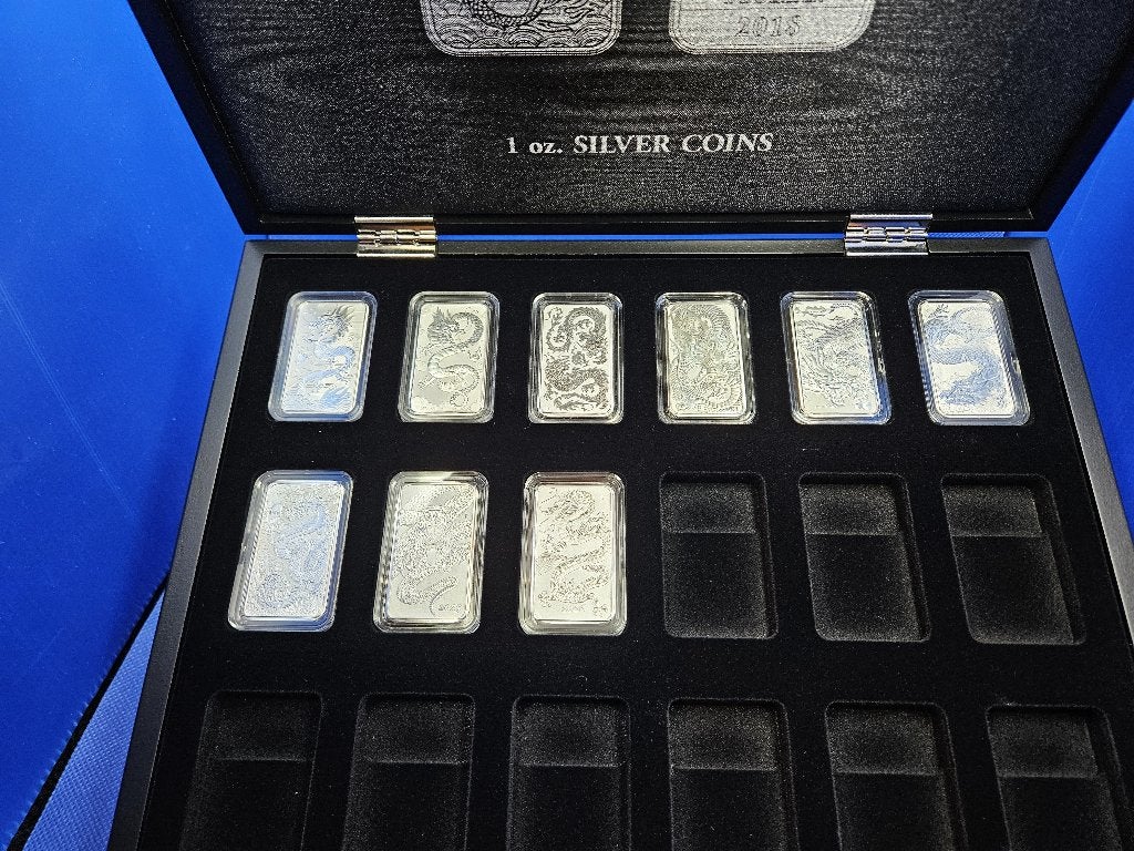 (A337) AUSTRALIA RECTANGLE DRAGONS ONE OUNCE ALLE 9 JAREN, Ophalen of Verzenden, Setje, Zilver