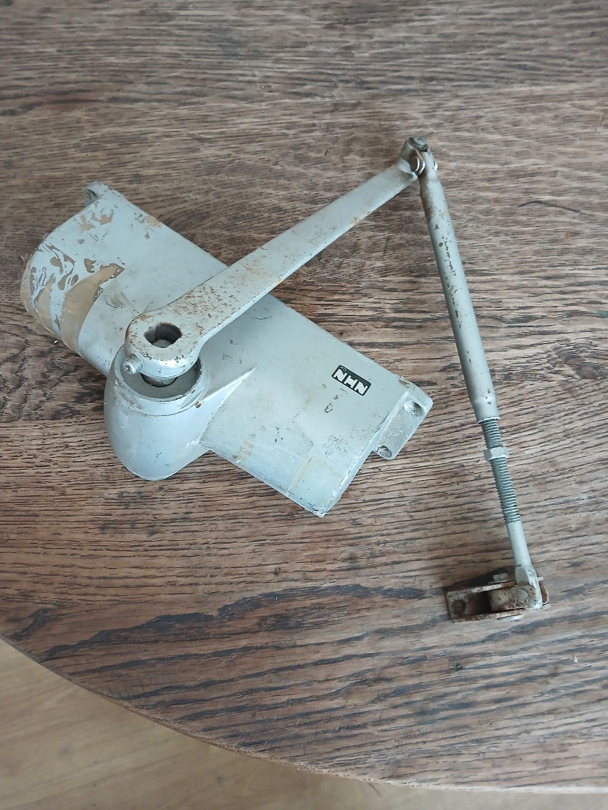 Gebruikte deurdranger - NHN, Ophalen of Verzenden, Gebruikt, Overige materialen, Overige typen