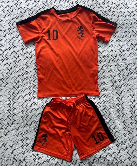 Oranje Holland voetbaltenue maat 128, Ophalen of Verzenden, Gebruikt, Jongen of Meisje, Sport- of Zwemkleding