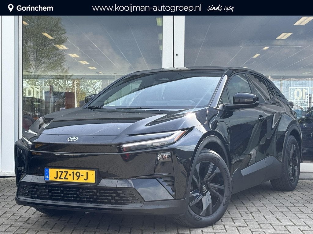 Toyota C-HR+ First Edition 77 kWh, Auto's, Toyota, Gebruikt, 607 km, Leder en Stof, Zwart