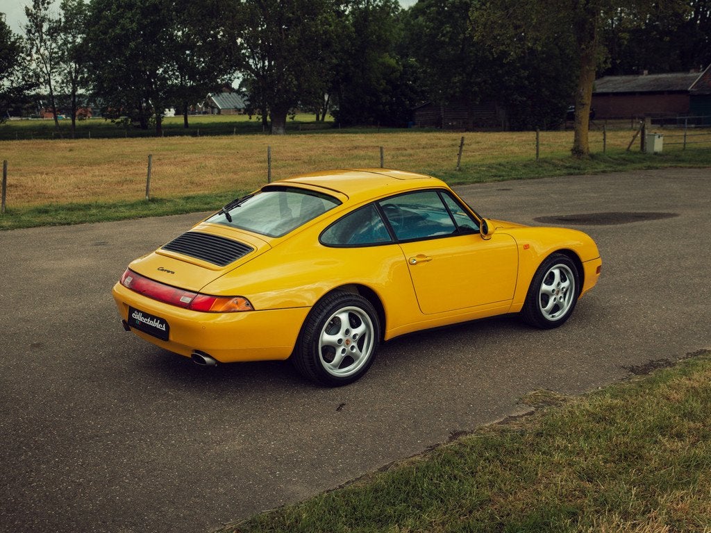 Porsche 911 3.6 Coupé Speedyellow (bj 1996, automaat), Automaat, Achterwielaandrijving, Zwart, 4 stoelen
