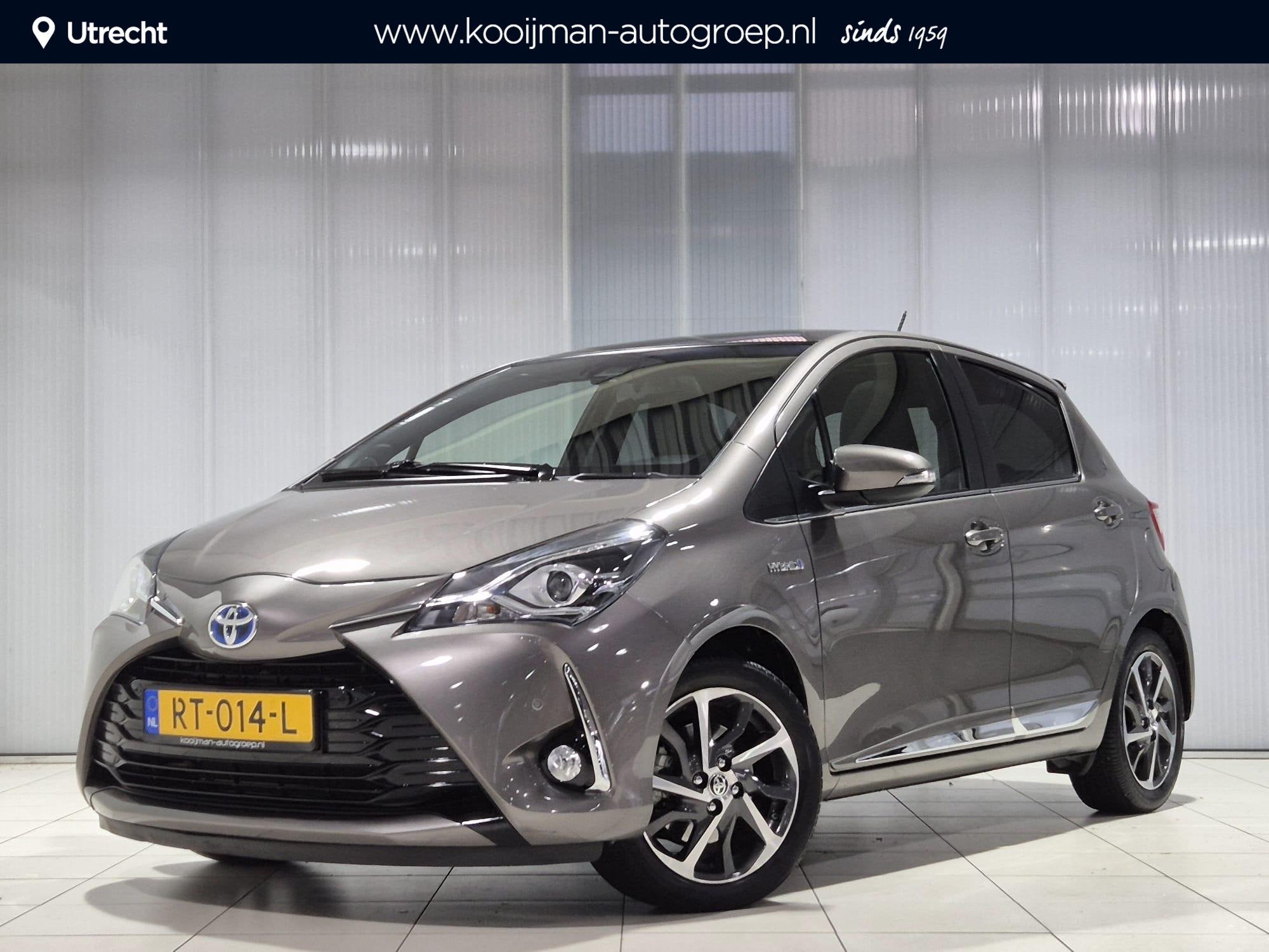 Toyota Yaris 1.5 Hybrid Premium Half lederen bekleding , Cam, Auto's, Toyota, Dealer onderhouden, Gebruikt, Euro 6, 4 cilinders